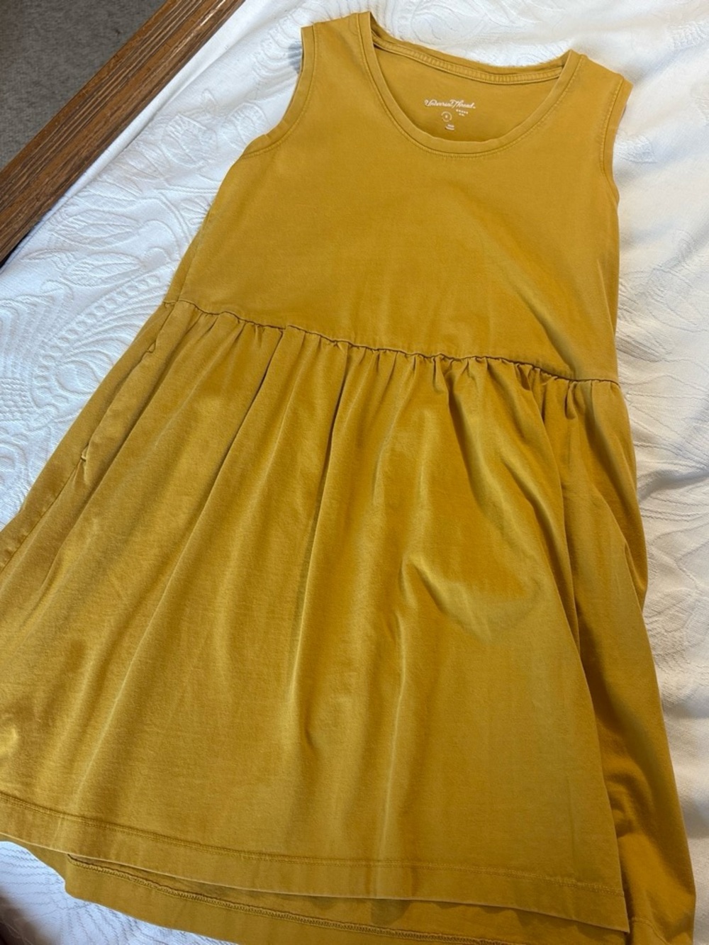 Yellow sleeveless dress with pockets